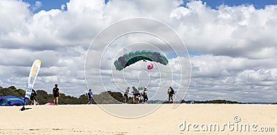 Tandem Skydive Landing on the Beach Editorial Stock Photo