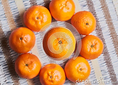 tangerine basket artisan tablecloth background Stock Photo