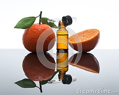 Tangerine / Mandarin essential oil bottle with dropper Stock Photo