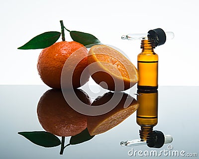 Tangerine / Mandarin essential oil bottle with dropper Stock Photo