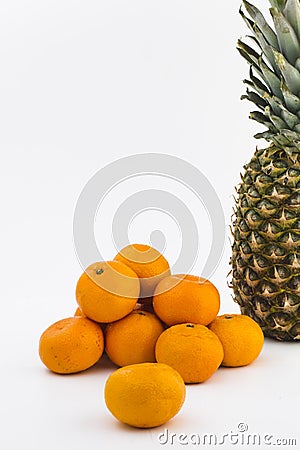 Tangerine and pineapple Stock Photo