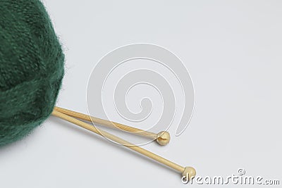 Tangle thread for knitting. Knitting needles are stuck into it. Stock Photo