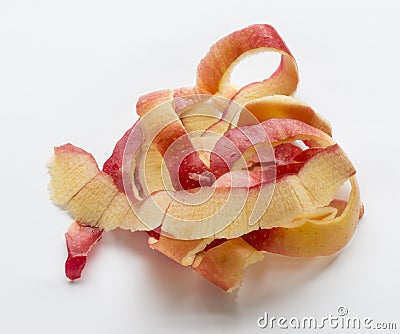 Tangled apple peelings laying on white background Stock Photo