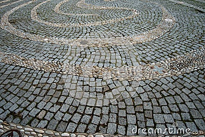Tangled decorative path made with pebbles Stock Photo