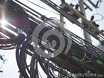 Tangled electrical wires are dangerous Stock Photo