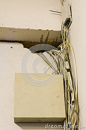 Tangled network cables and wires in server room Stock Photo