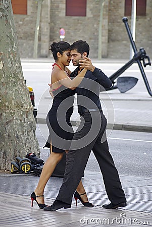 Tango dancers along the streets in Barcelona. Editorial Stock Photo