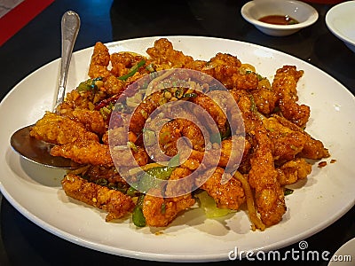 Tangsuyuk, or sweet and sour pork, a popular Korean-Chinese sweet and sour pork dish. Stock Photo