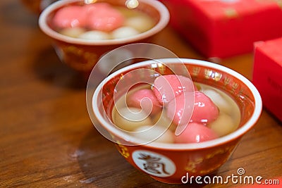 Tangyuan or tang yuan Chinese sweetheart soup is a Chinese dessert made from glutinous rice Stock Photo