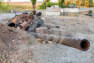 Destroyed tank of the Ukrainian armed forces, War actions aftermath, Ukraine and Donbass conflict Stock Photo