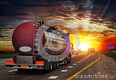 Tanker with chrome tanker on the highway. Stock Photo