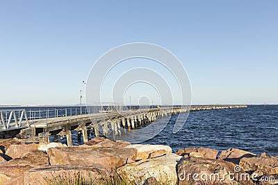 Tanker Jetty into the Ocean Stock Photo