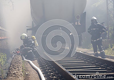 Tanker train fire firefighters Editorial Stock Photo