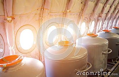Tanks with water at the portholes, for test flights in aircraft prototypes. Stock Photo