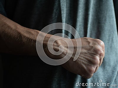 Tanned hands with protruding vessels of a young guy. sexy hands Stock Photo