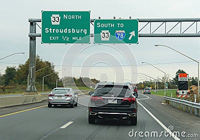 Tannersville, Pennsylvania, U.S - October 22, 2021 - Highway signs and traffic on Interstate 78 and Route 33 into Stroudsburg Editorial Stock Photo