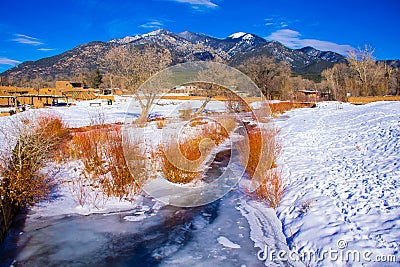 Taos New Mexico Snow covered valley Red River MountainScape Stock Photo