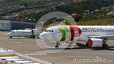 TAP Air Portugal plane at Madeira airport Editorial Stock Photo