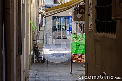 Tapas bar in an empty street in Granada Editorial Stock Photo