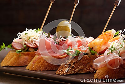 Tapas on Crusty Bread Stock Photo