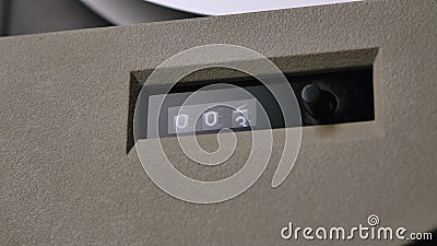 Tape counter with switch button and numeric display close up. Retro concept of turntable reel to reel tape recorder. Old Stock Photo