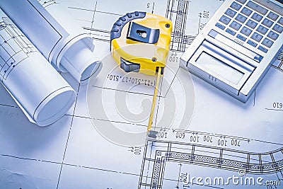 Tapeline rolls of blueprints calculator Stock Photo