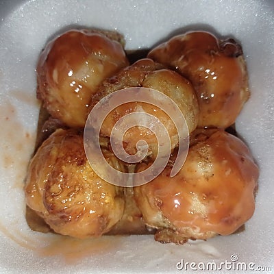 tapioca flour-based food processed with egg mixture with quail egg filling Stock Photo