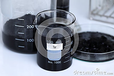 Tar in container, Laboratory Quality Testing Concepts Stock Photo