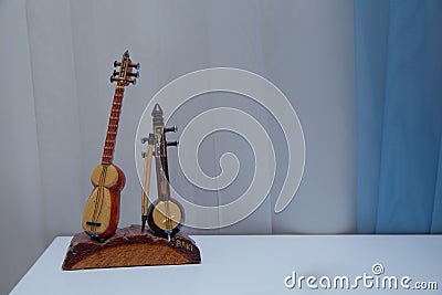 Tar string instrument . Kamancha, Kamanche, Kemancheh, Kamanjah, Kabak kemane . Souvenir Tar and Kamancha. East music instruments Editorial Stock Photo