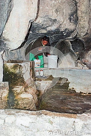Tarahumara Indian woman taking water Editorial Stock Photo