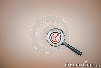 Target board inside magnifier glass for focus business objective with copy space Stock Photo