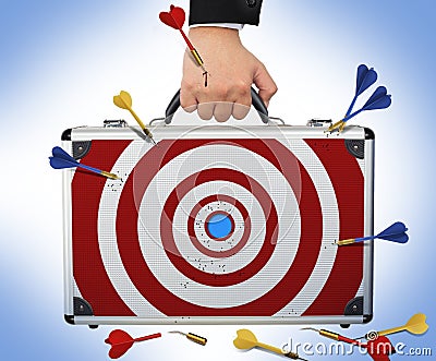 Target business brief case with Hand and arm holding Stock Photo