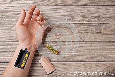 Target. Hand of a man with slot for charging batteries target Stock Photo