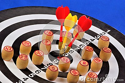 The target of the sport of Darts and bingo chips. Darts game in which players rivals throw Darts at a round target to hit the Stock Photo