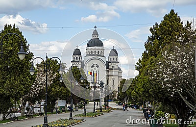 Avram Iancu statue and Ascension of the Lord, Orthodox Cathedral in the Roses Square in Targu Mures. Editorial Stock Photo