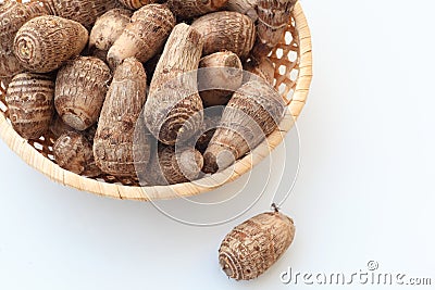 Taros in bamboo basket Stock Photo
