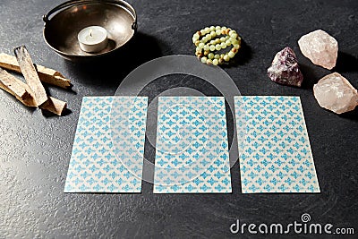 Tarot cards and magic staff for divination ritual Stock Photo