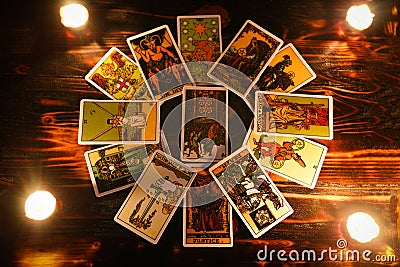 Tarot cards for tarot readings psychic as well as divination with candle light - fortune teller reading future or former and Stock Photo