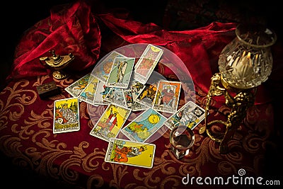 Tarot Cards Spread and scattered on Table Haphazardly Stock Photo