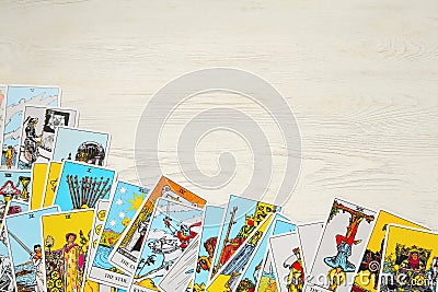 Tarot cards on white wooden table, top view. Space for text Stock Photo