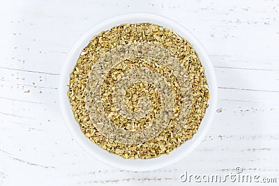 Tarragon spice herb from above bowl wooden board Stock Photo