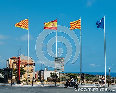 Uropean Union flag, Catalonian, Spanish and Tarragonian flags lined up at historic centre of Tarragonia, Spain Editorial Stock Photo