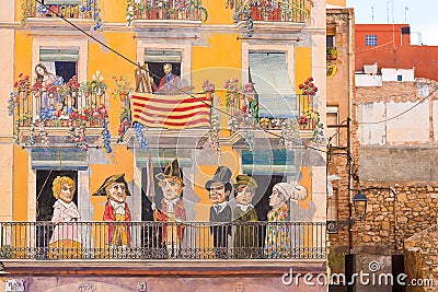 TARRAGONA, SPAIN - MAY 1, 2017: Editorial photos at home in Tarragona with a fake painted facade. Close-up. Editorial Stock Photo