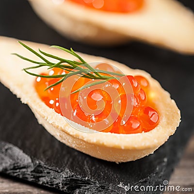 Tartlets with red caviar Stock Photo