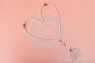 Tasbih from pearls with the inscription Stock Photo