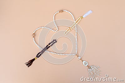 Tasbih from pearls with the inscription Stock Photo