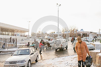 Tashkent, Uzbekistan. December 2020. People and cars at Chorsu market in winter Editorial Stock Photo