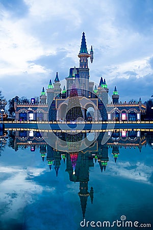 Tashkent, Uzbekistan - January 7, 2023: `Magic City` amusement park on a late evening. Magic city park. Fantastic castle Editorial Stock Photo