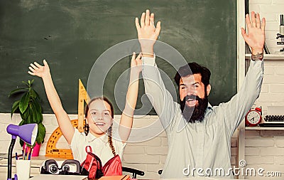 Task successfully done. Homeschooling with father. Help study. Discipline upbringing. Man bearded pedagogue study Stock Photo