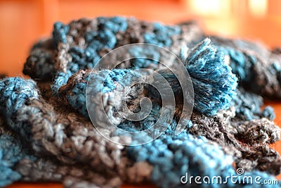 Tassel on warm crochet scarf Stock Photo